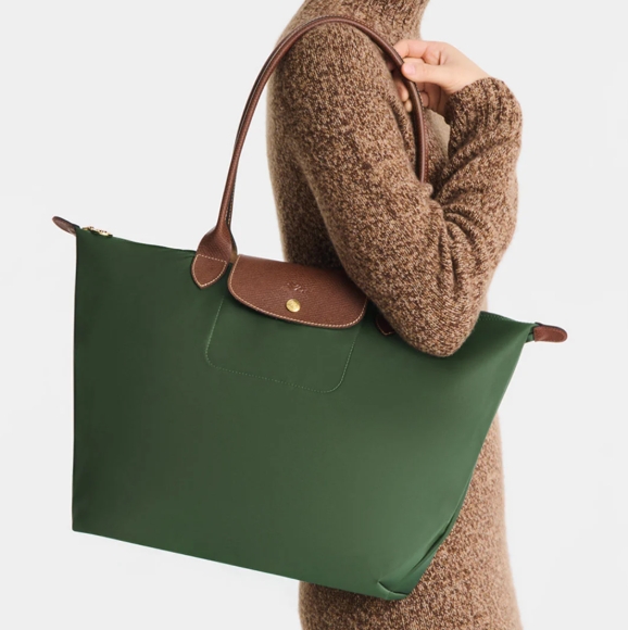 Elegance i bev&aelig;gelse: Longchamp Danmark og taskens tidl&oslash;se fort&aelig;lling